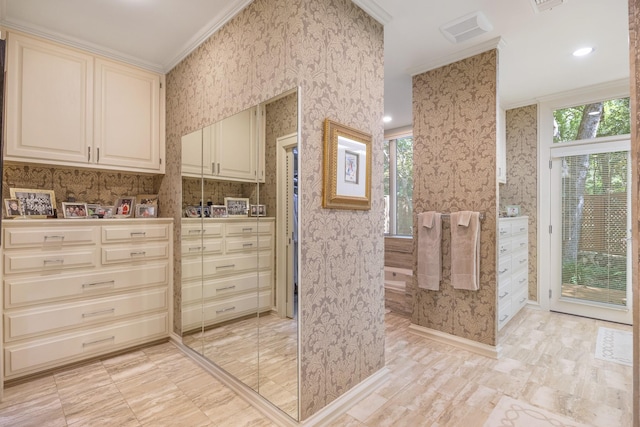 bathroom featuring ornamental molding