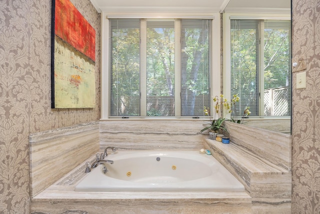 bathroom with a relaxing tiled tub