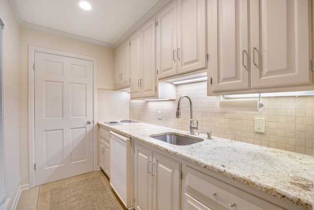 kitchen with dishwasher, sink, light stone counters, backsplash, and ornamental molding