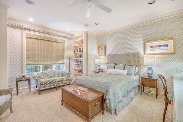 bedroom featuring crown molding, ceiling fan, and light carpet