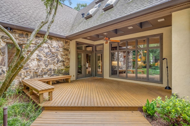 wooden terrace with french doors and ceiling fan