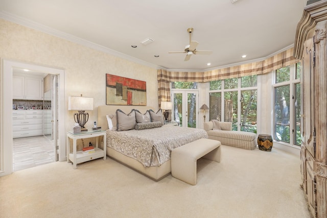 bedroom featuring ceiling fan, french doors, carpet floors, and ornamental molding