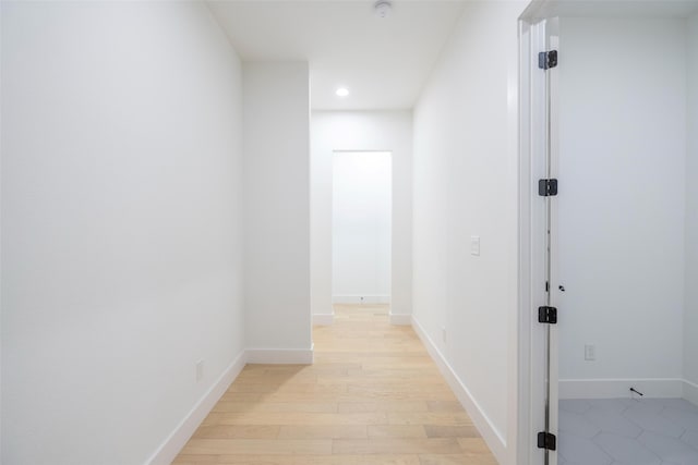 corridor featuring light wood-type flooring