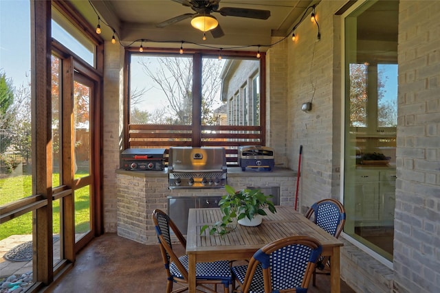 sunroom / solarium with ceiling fan