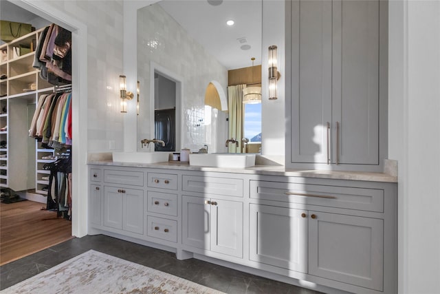 bathroom featuring hardwood / wood-style floors and vanity