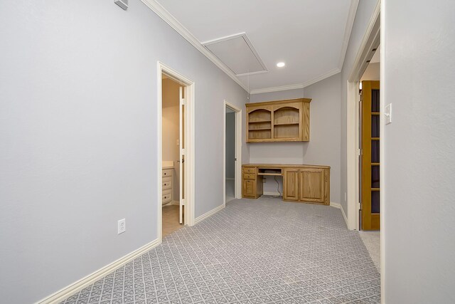 hallway featuring light carpet and crown molding