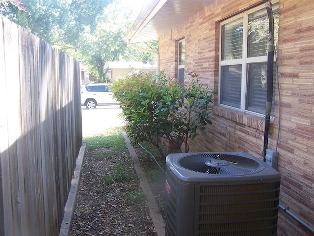 view of yard featuring central AC unit