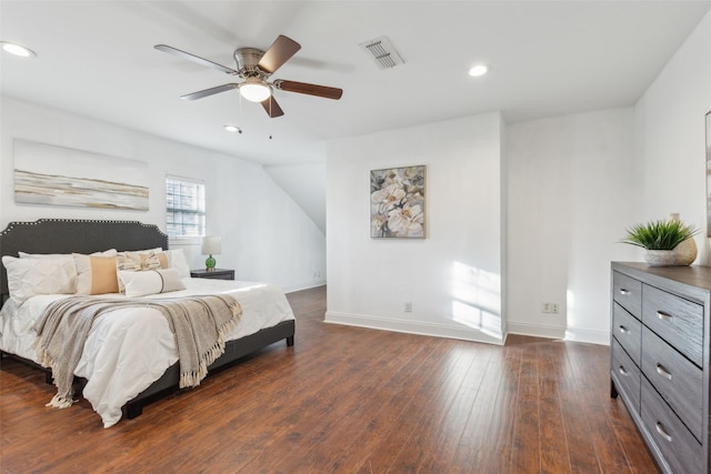 bedroom featuring ceiling fan and dark hardwood / wood-style floors