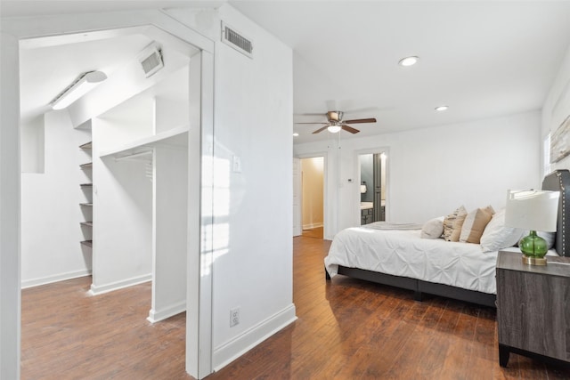 bedroom featuring ceiling fan and dark hardwood / wood-style flooring