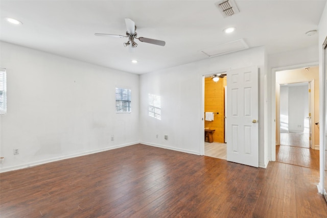 spare room featuring hardwood / wood-style floors