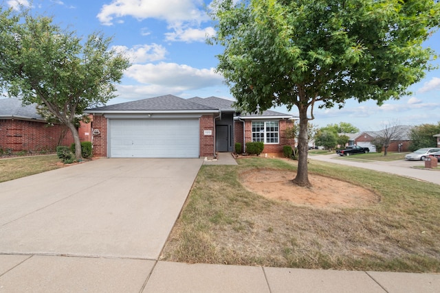 ranch-style home with a front yard and a garage