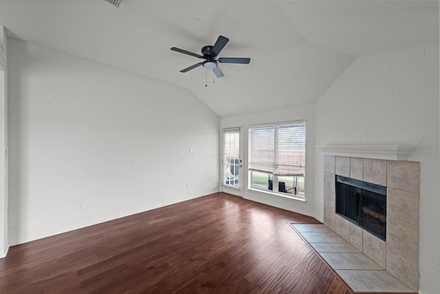 unfurnished living room with a tile fireplace, light hardwood / wood-style flooring, ceiling fan, and lofted ceiling