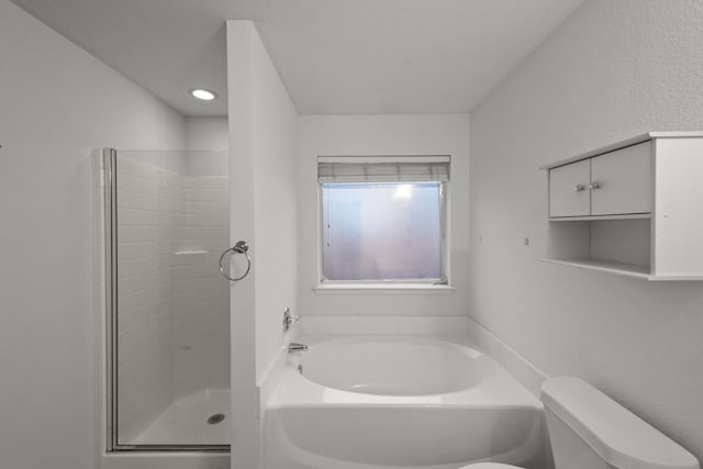 bathroom with separate shower and tub and toilet