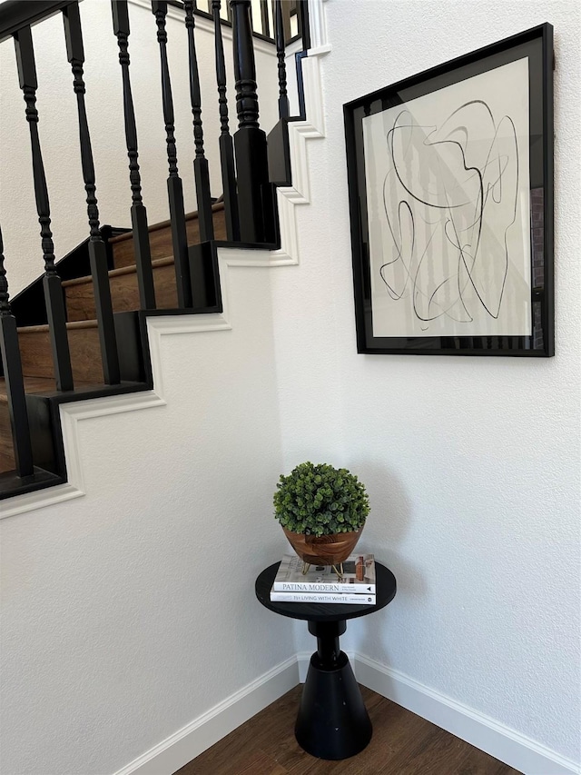 stairway with wood-type flooring