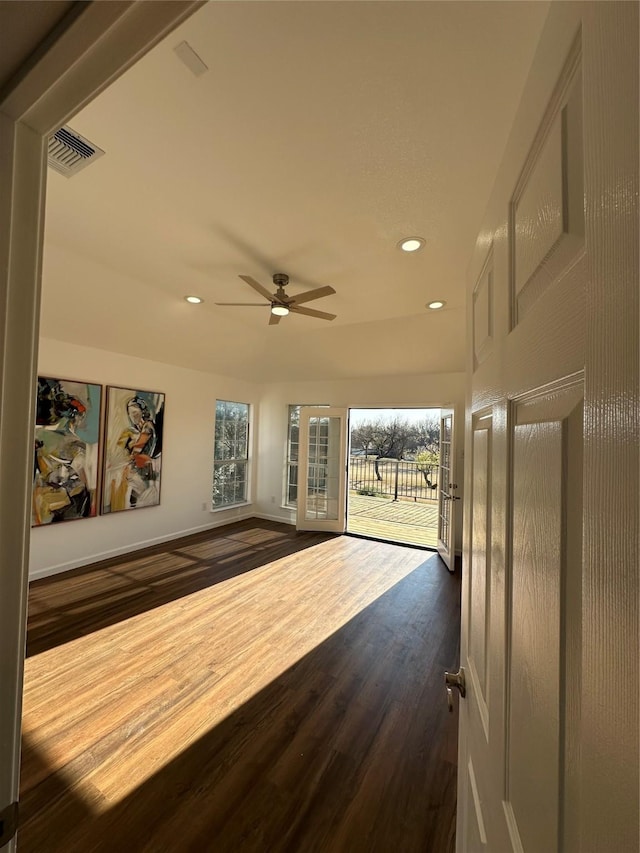 interior space featuring access to outside, ceiling fan, and hardwood / wood-style flooring