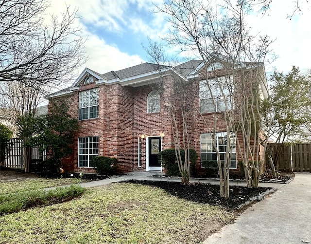 view of front of house with a front lawn