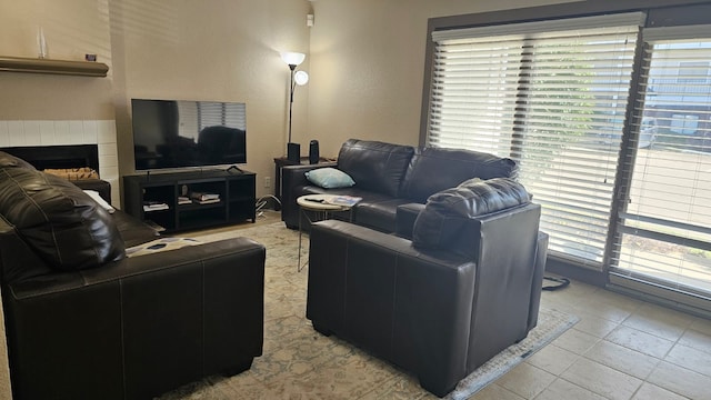 living room featuring a fireplace