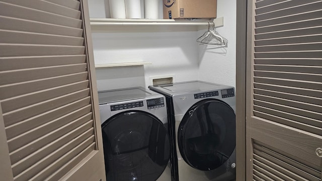 laundry area with washer and clothes dryer