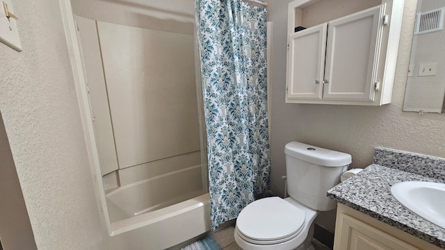 full bathroom with shower / bath combination with curtain, vanity, and toilet