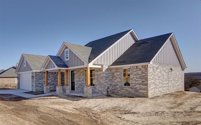 view of front of property featuring a garage