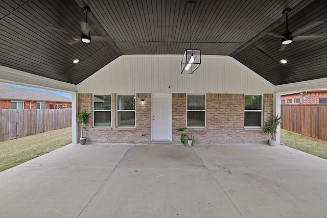 exterior space with ceiling fan and a patio area