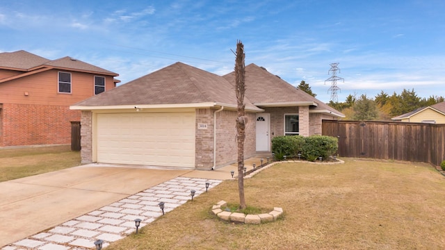 view of front facade featuring a garage and a front yard