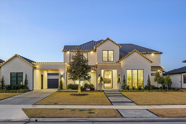 mediterranean / spanish-style home featuring a garage