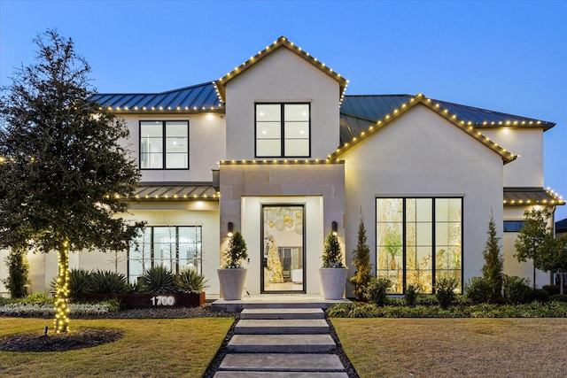 view of front of home featuring a yard