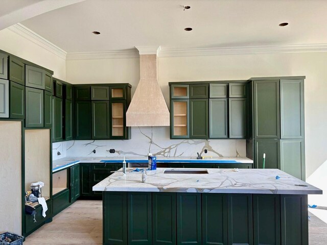 entryway featuring hardwood / wood-style flooring, a notable chandelier, and a towering ceiling