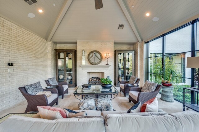 view of patio featuring an outdoor living space with a fireplace