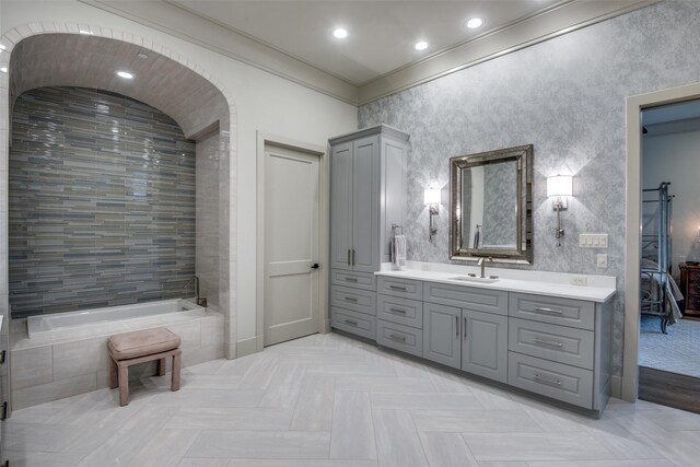 bathroom featuring vanity and crown molding