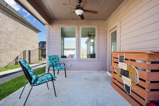 view of patio featuring ceiling fan