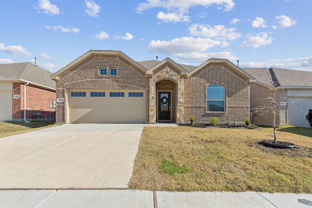 view of front facade with a front lawn and a garage