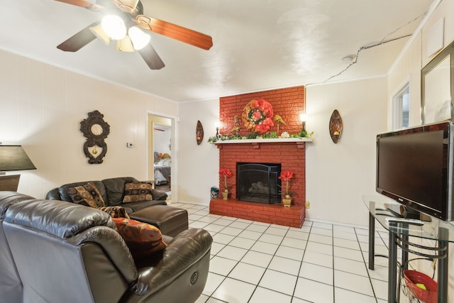 living room with light tile patterned floors, a brick fireplace, and ornamental molding