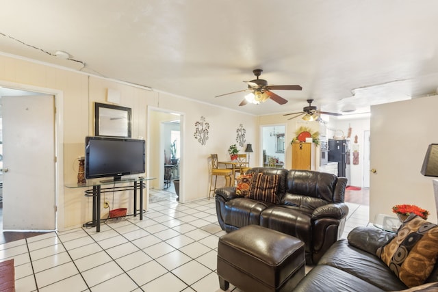 living room with ceiling fan, light tile patterned floors, and ornamental molding