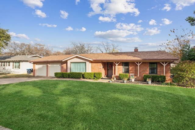 single story home featuring a garage and a front lawn