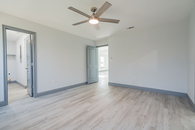 interior space with ceiling fan and light hardwood / wood-style flooring