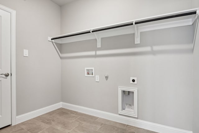 laundry area featuring gas dryer hookup, light tile patterned flooring, washer hookup, and hookup for an electric dryer