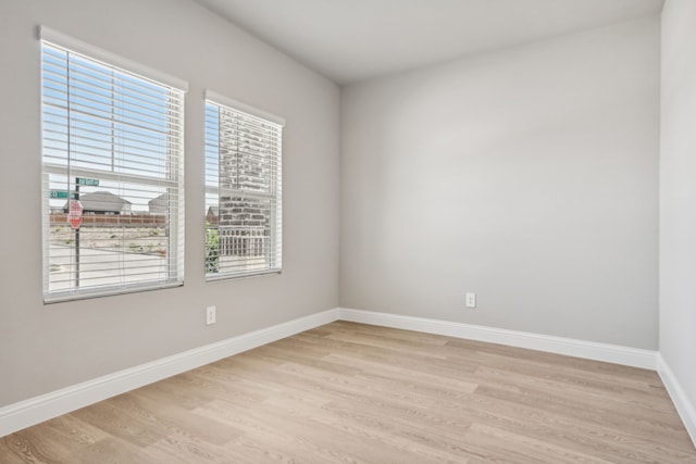 empty room with light wood-type flooring