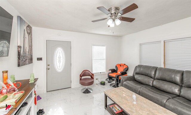 living room with ceiling fan