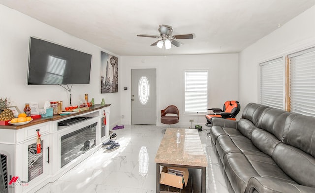 living room featuring ceiling fan