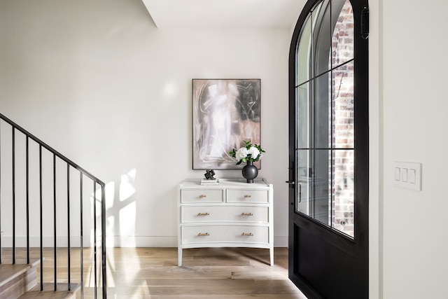 foyer with light hardwood / wood-style floors