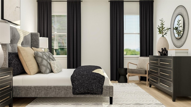 bedroom featuring multiple windows and light hardwood / wood-style floors