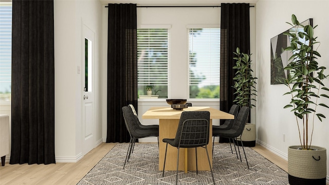 dining space with wood-type flooring