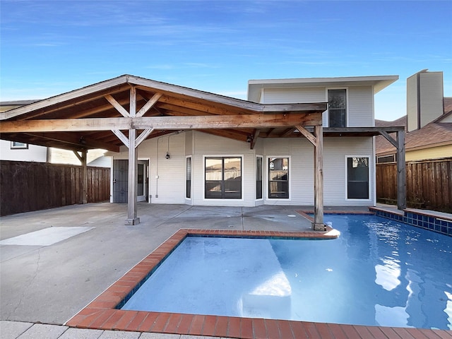 817 Foxridge Dr, Arlington, TX 76017 - back of house featuring a patio, a fenced backyard, and a carport
