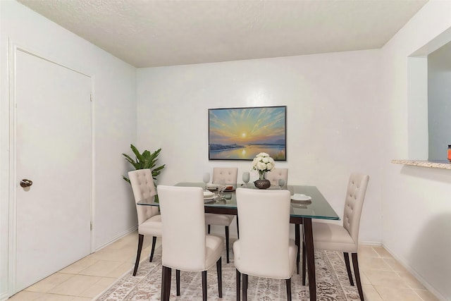 dining room featuring light tile patterned floors