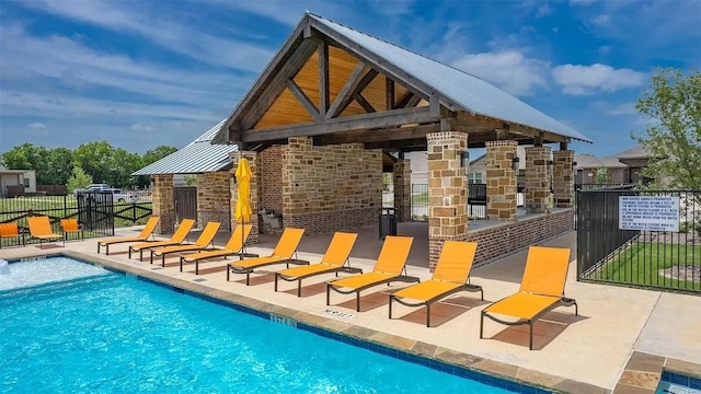 view of pool featuring a patio area