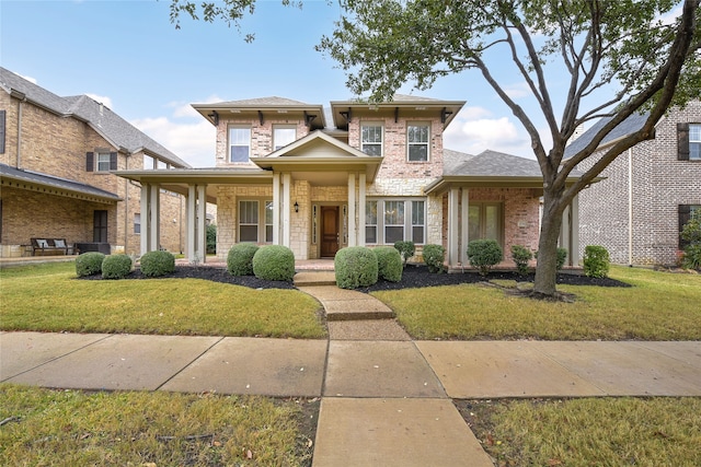 view of front of home with a front lawn