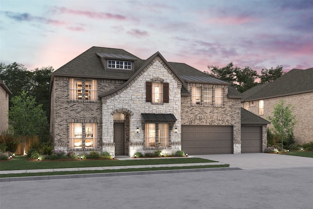 view of front of house with a garage