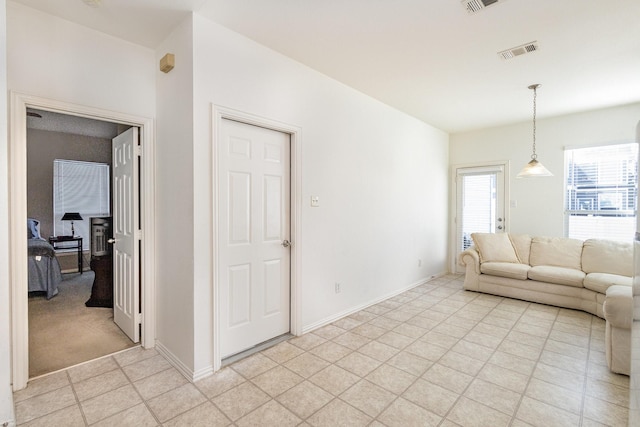 living room featuring light carpet